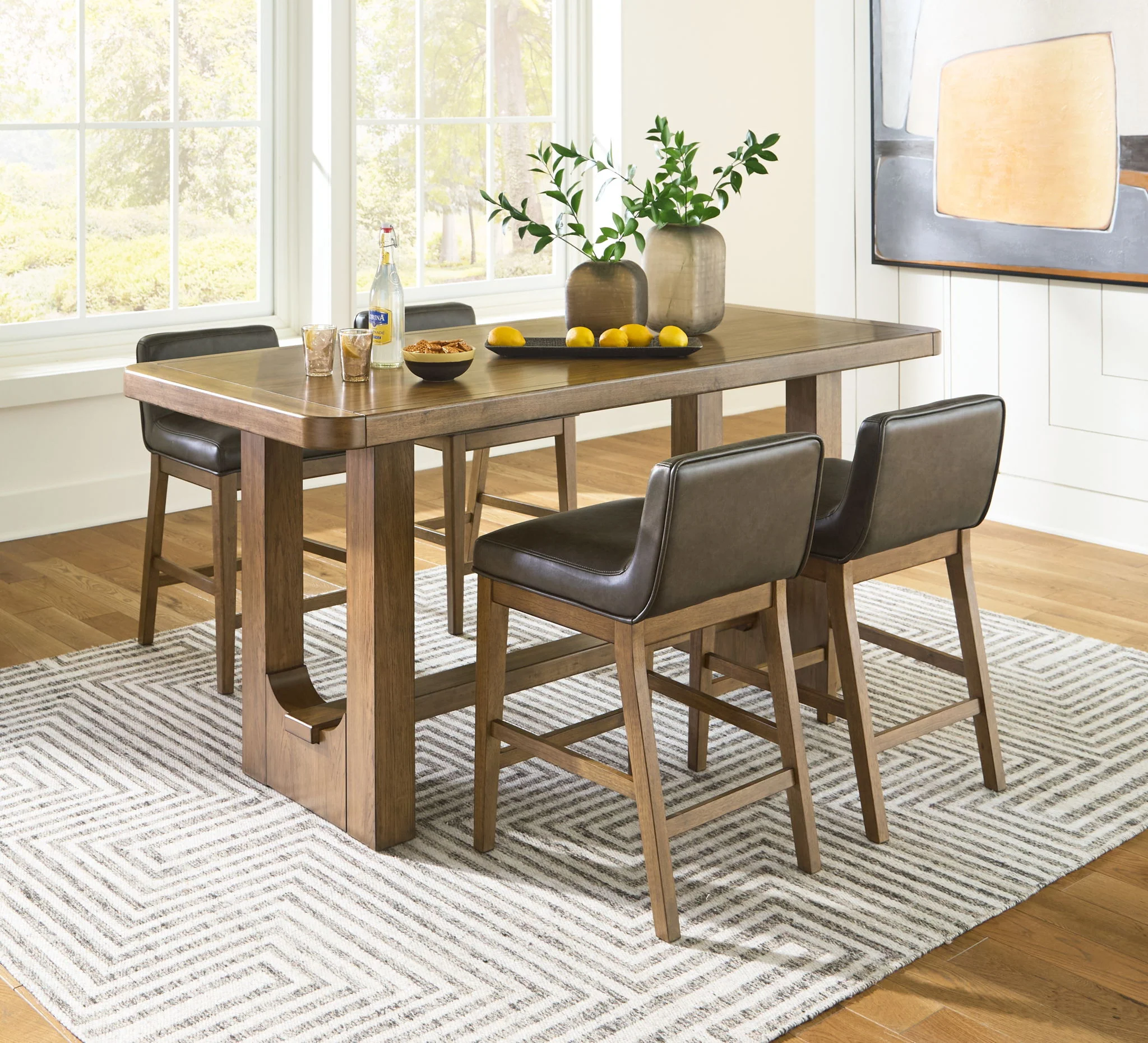 Cabalynn - Light Brown - 5 Pc. - Rectangular Dining Room Counter Table, 4 Upholstered Barstools - Image 2