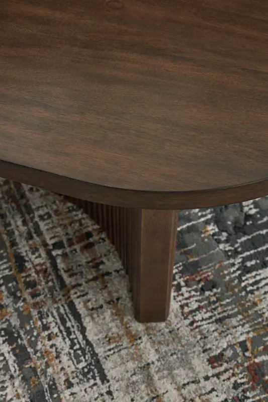 Korestone - Dark Brown - Oval Cocktail Table - Image 7